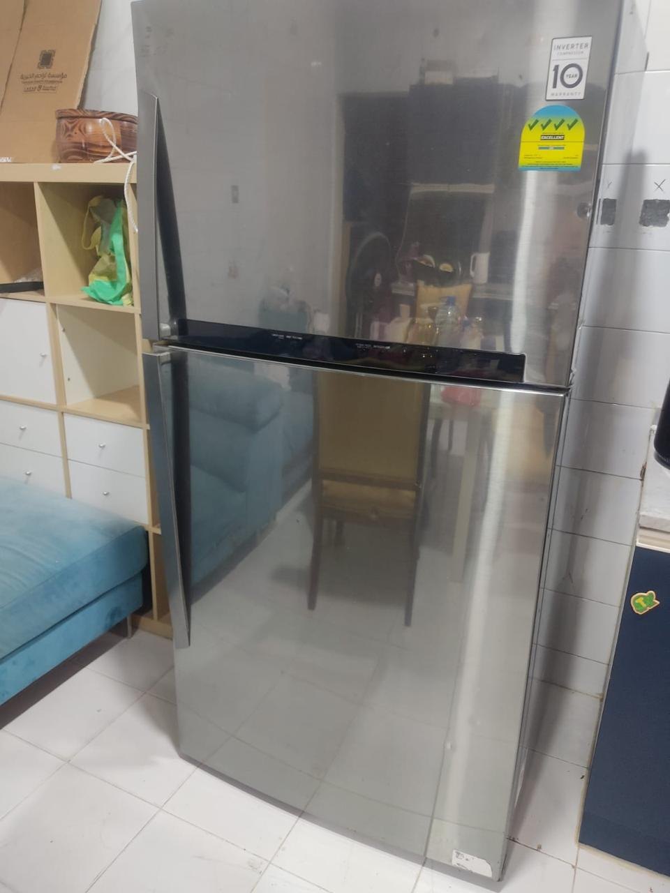 Stainless top-mount refrigerator on a UAE home visit